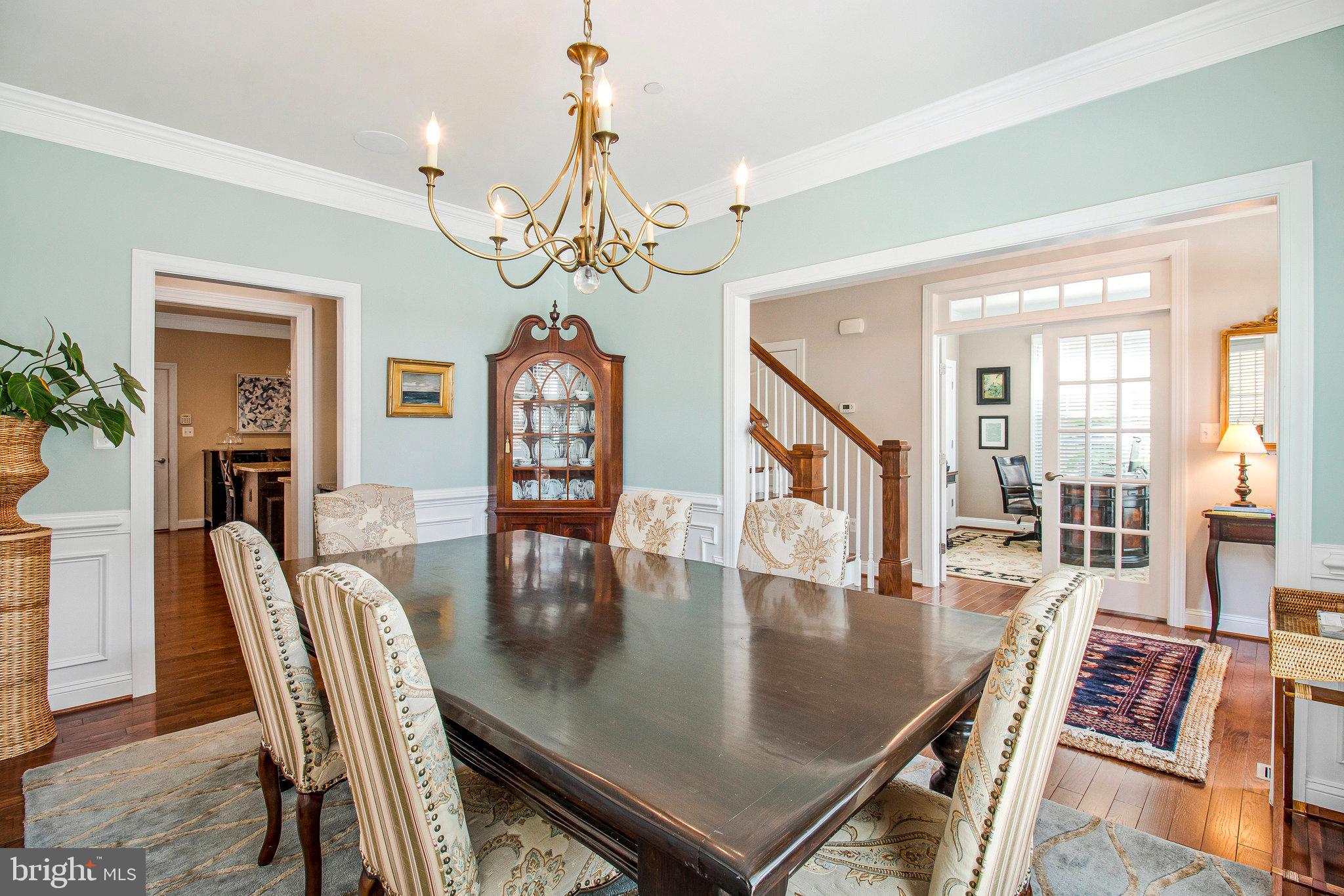 208 Beacon Place Northeast Washington, DC 20011 - Photo 12 of 48 a view of a dining room with furniture a chandelier and wooden floor