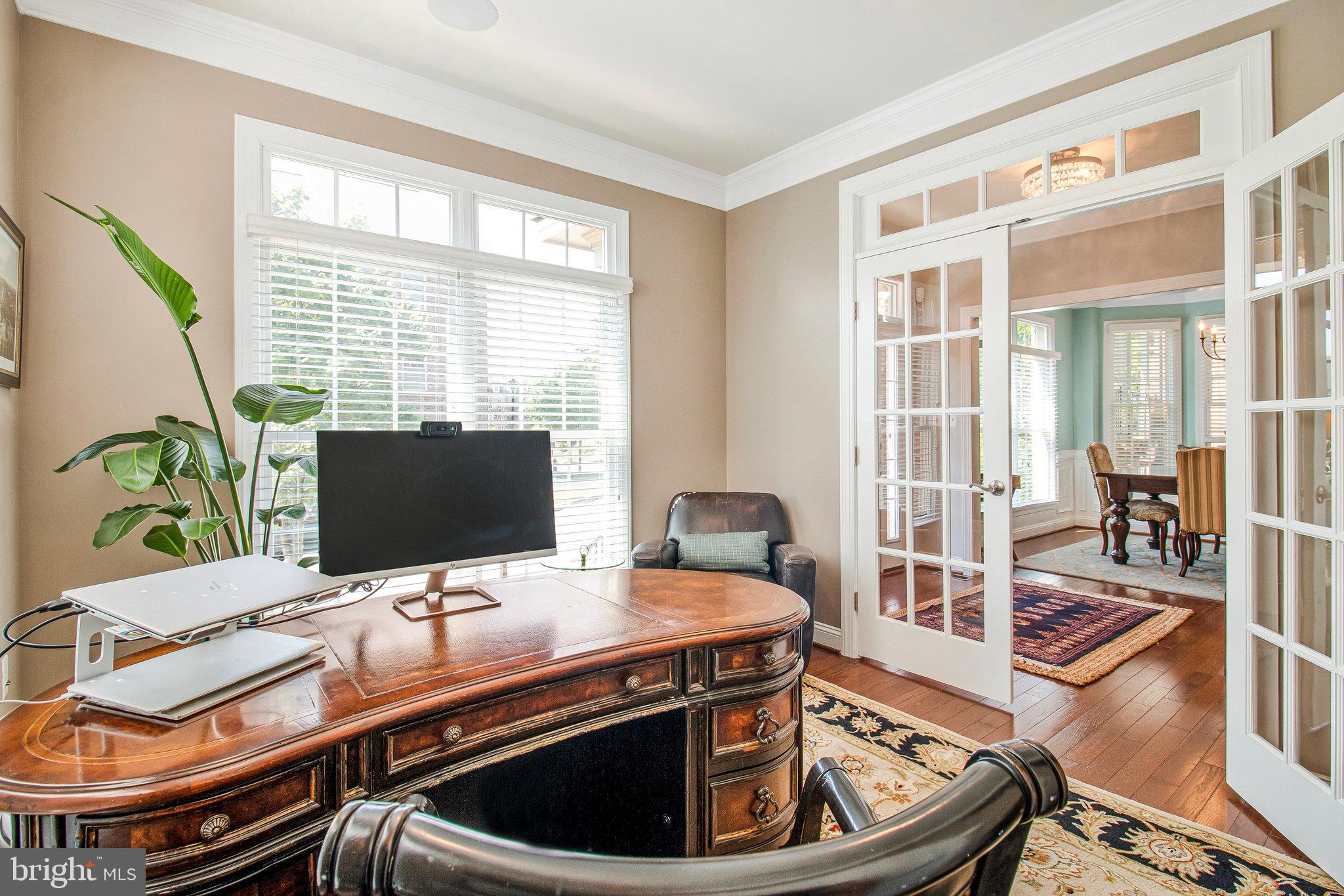 208 Beacon Place Northeast Washington, DC 20011 - Photo 16 of 48 a view of a workspace with furniture and a window