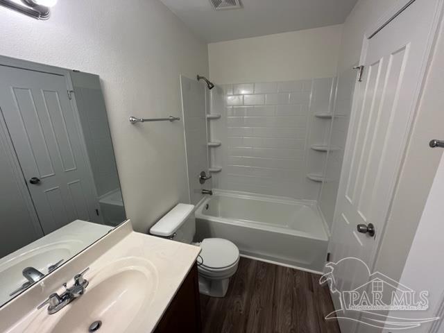 10154 Vixen Place Pensacola, FL 32514 - Photo 11 of 12 a bathroom with a sink a toilet and a bathtub