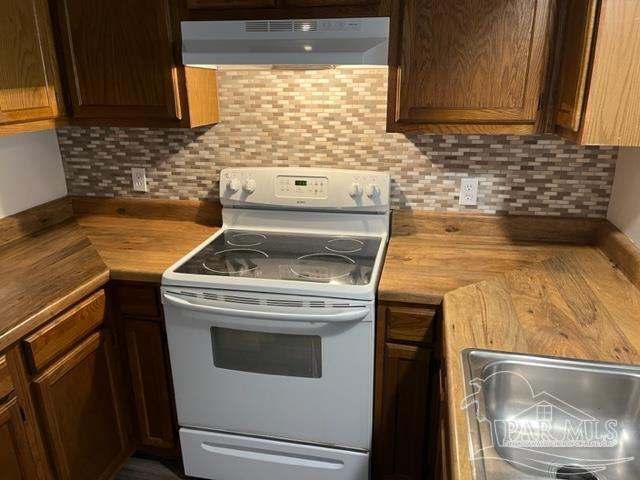 10154 Vixen Place Pensacola, FL 32514 - Photo 2 of 12 a stove top oven sitting inside of a kitchen