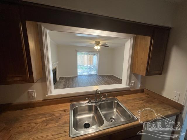10154 Vixen Place Pensacola, FL 32514 - Photo 3 of 12 a bathroom with a sink and a mirror