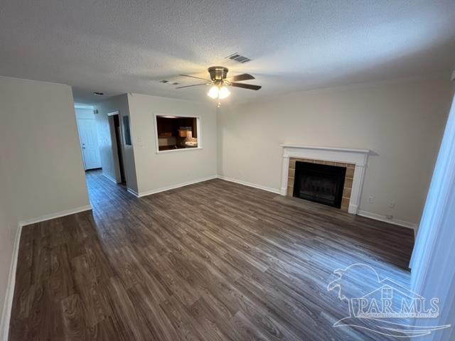 10154 Vixen Place Pensacola, FL 32514 - Photo 4 of 12 a view of empty room with wooden floor and fan