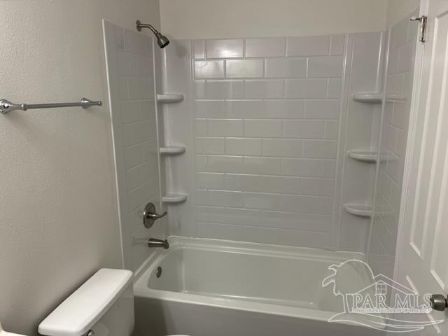 10154 Vixen Place Pensacola, FL 32514 - Photo 10 of 12 a bathroom with a bathtub and a shower