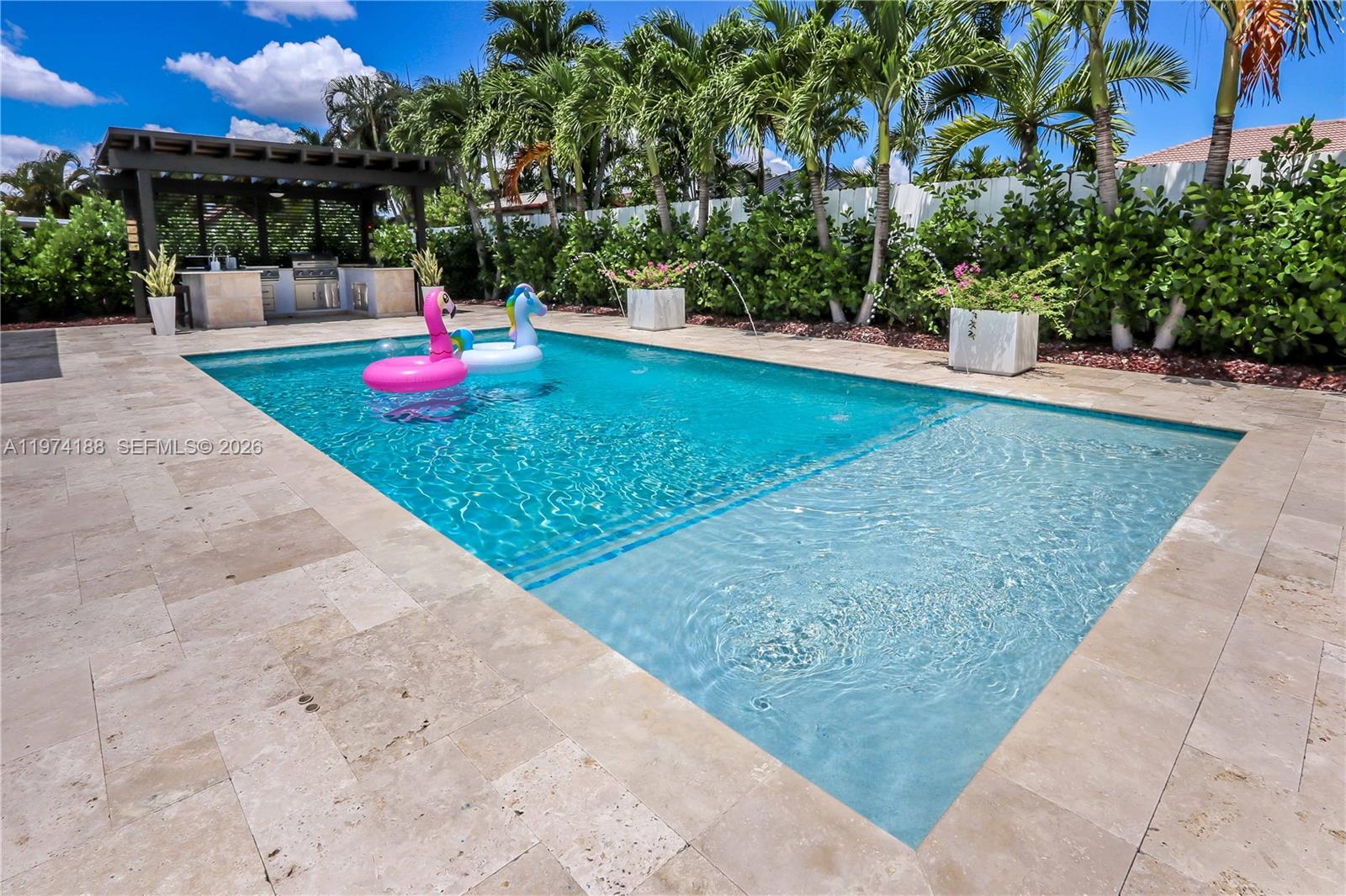 14211 Southwest 31st Street Miami, FL 33175 - Photo 13 of 15 a front view of a house with swing