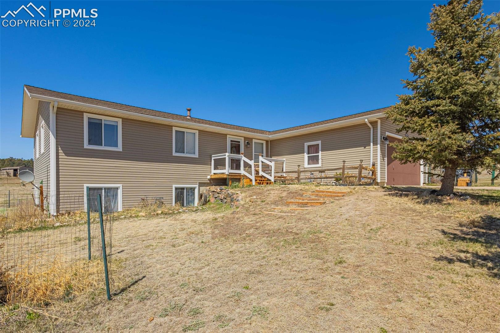 17650 Fremont Fort Road Peyton, CO 80831 - Photo 36 of 41 View of rear view of house