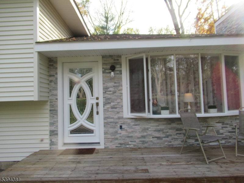192 Bryans Road Hampton, NJ 08827 - Photo 11 of 32 a front view of a house with garden