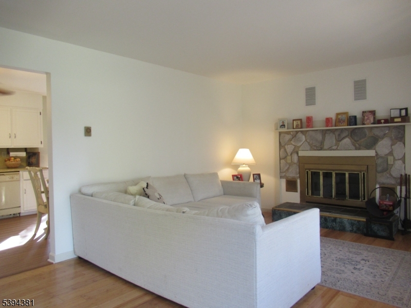 192 Bryans Road Hampton, NJ 08827 - Photo 12 of 32 a living room with furniture and a fireplace