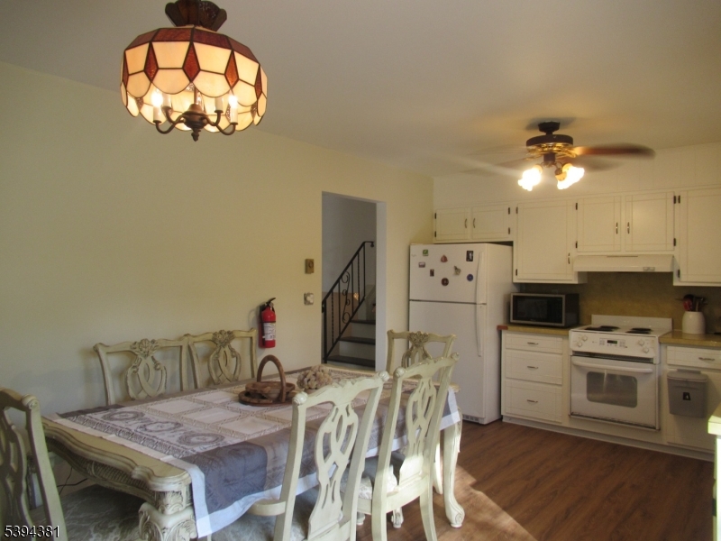 192 Bryans Road Hampton, NJ 08827 - Photo 17 of 32 a view of a dining room with furniture and chandelier