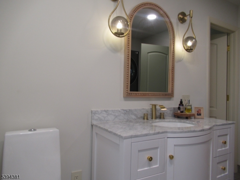192 Bryans Road Hampton, NJ 08827 - Photo 18 of 38 a bathroom with a sink and a mirror