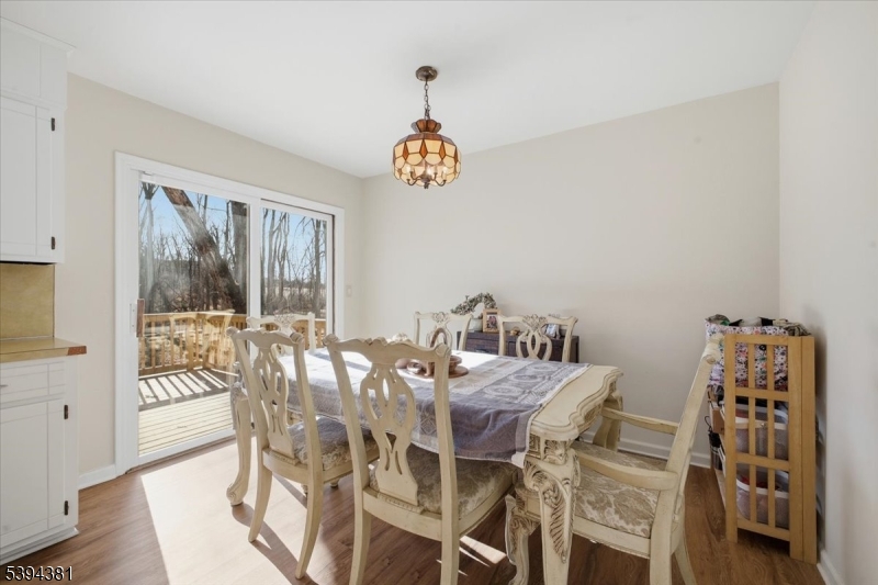 192 Bryans Road Hampton, NJ 08827 - Photo 6 of 38 a view of a dining room with furniture window and wooden floor