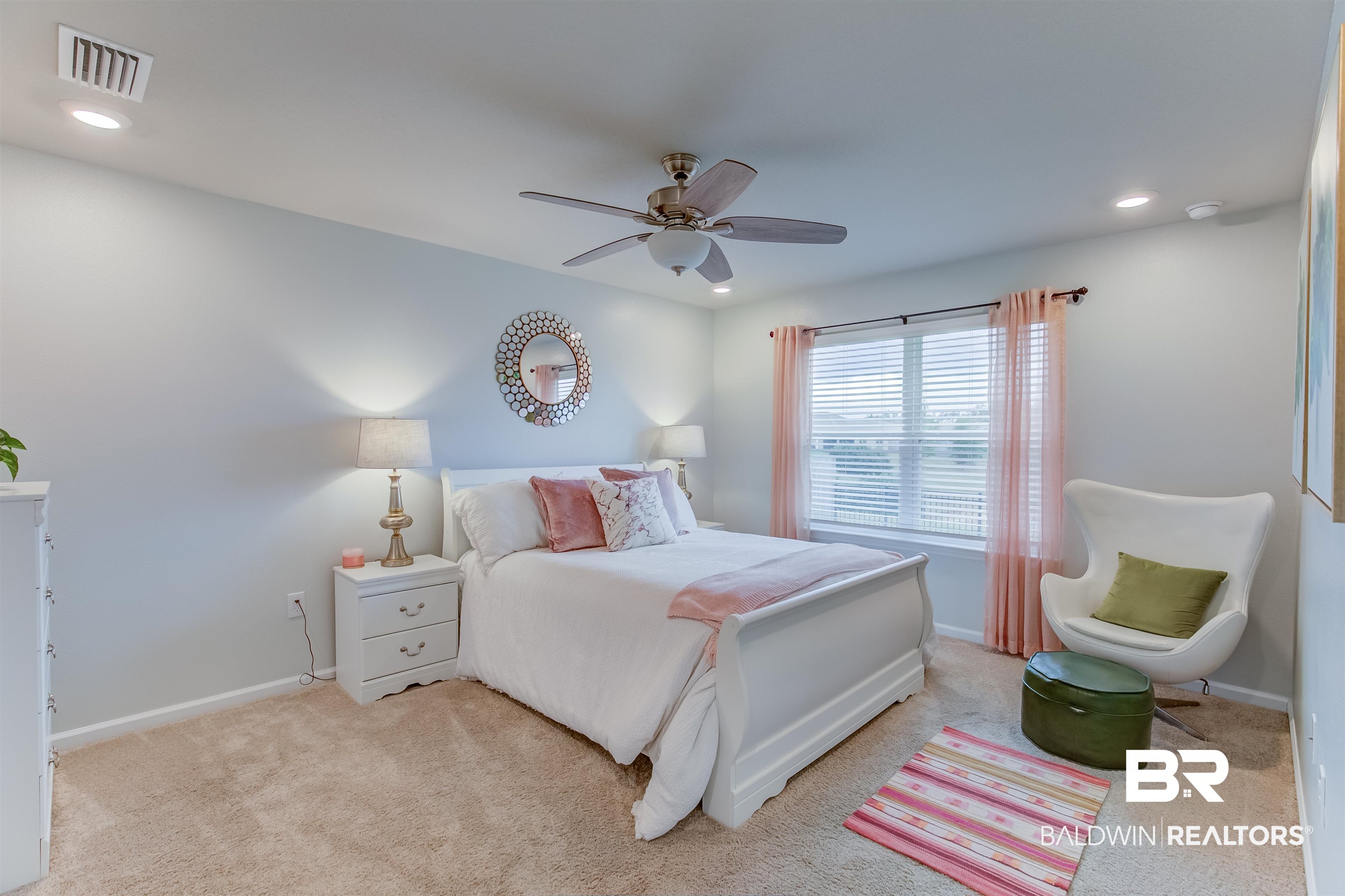 8033 Irwin Loop Daphne, AL 36526 - Photo 21 of 38 Carpeted room featuring a window with blinds and sheer drapes, a ceiling fan with integrated lighting, and recessed ceiling lights