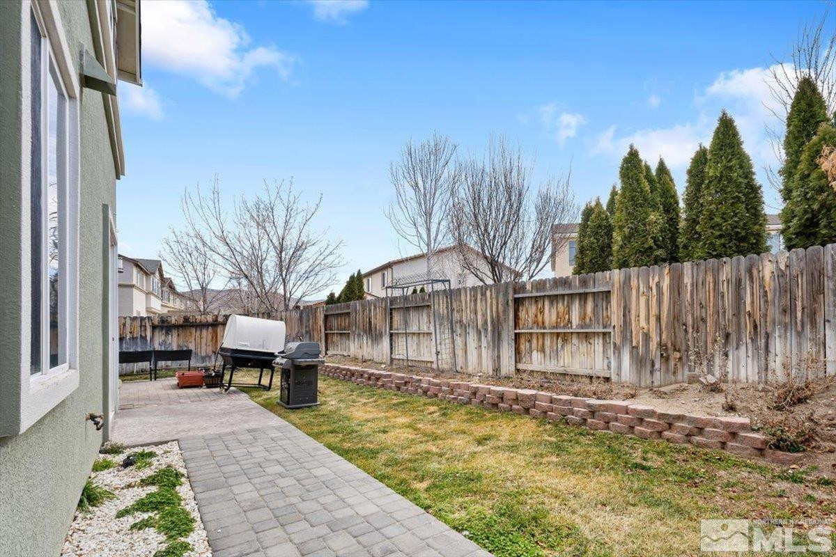1950 Red Willow Drive Reno, NV 89521 - Photo 33 of 39 a backyard of a house with table and chairs