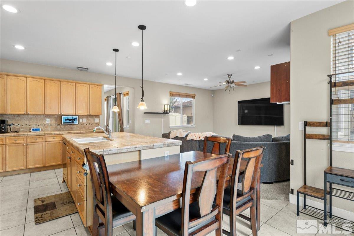 1950 Red Willow Drive Reno, NV 89521 - Photo 4 of 39 a large kitchen with a table and chairs