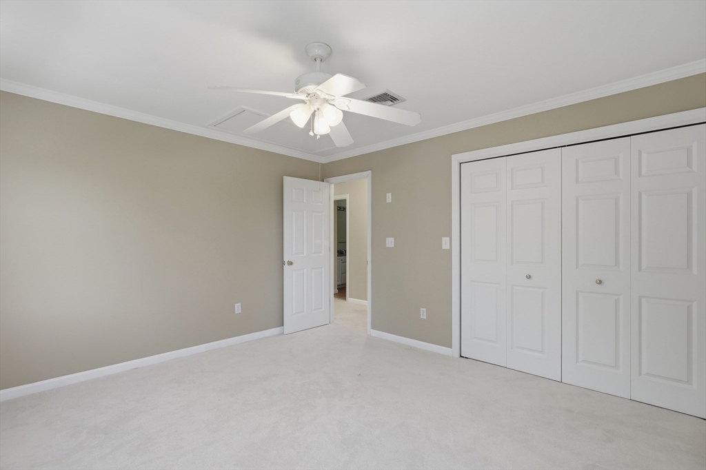61 Indian Head Road Framingham, MA 01701 - Photo 22 of 42 a view of an empty room and chandelier fan