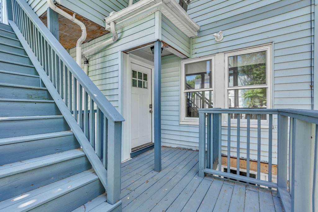 74 Ruthven Street, Unit 1 Boston, MA 02121 - Photo 9 of 11 a view of a house with wooden floor