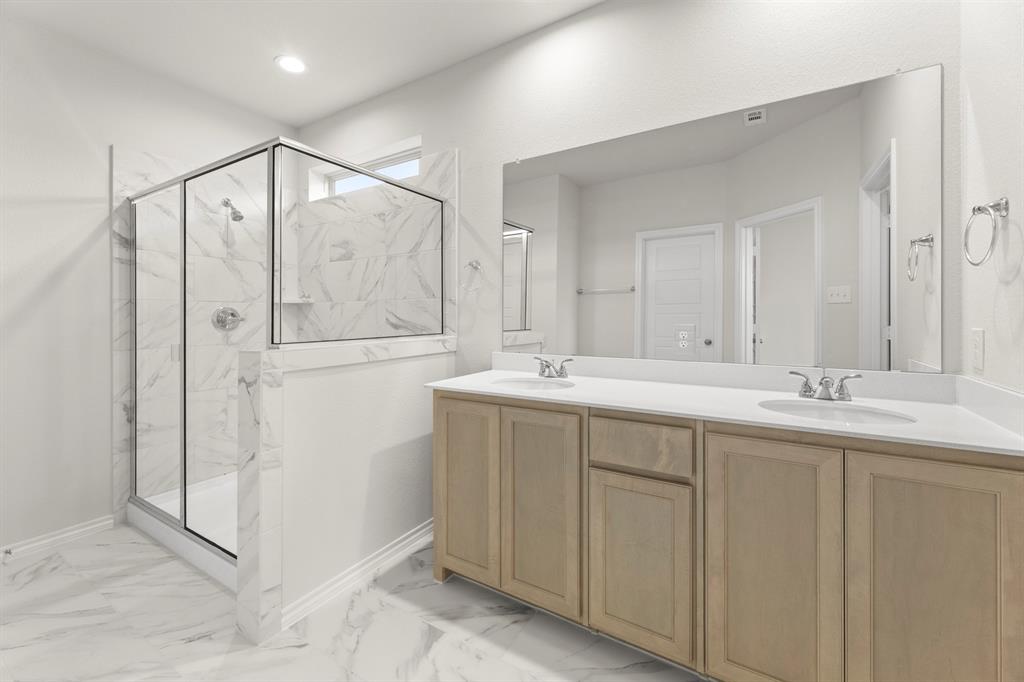 1713 Teton River Drive Blue Ridge, TX 75424 - Photo 18 of 29 a bathroom with double sink and a mirror