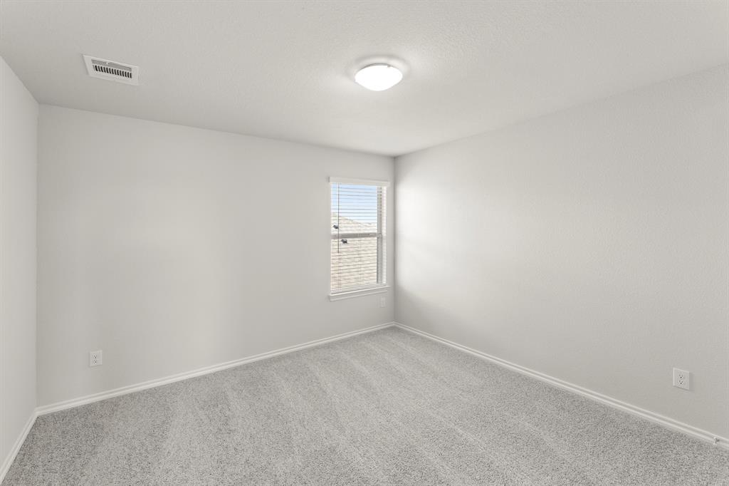 1713 Teton River Drive Blue Ridge, TX 75424 - Photo 24 of 29 an empty room with a window