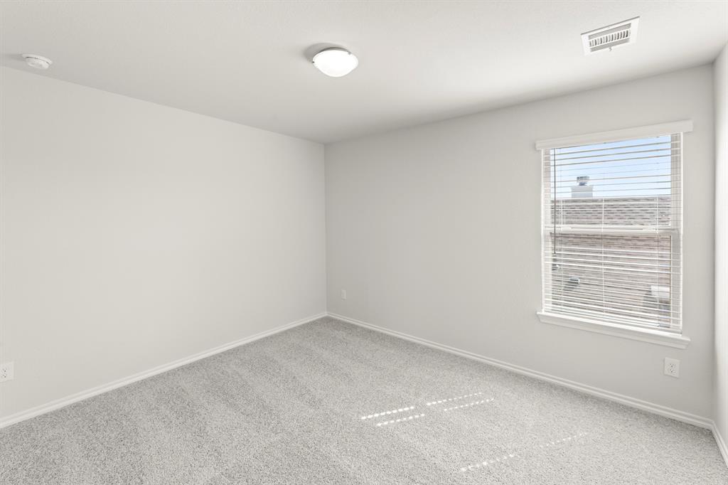 1713 Teton River Drive Blue Ridge, TX 75424 - Photo 25 of 29 an empty room with a window