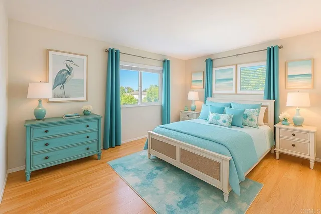 a bedroom with a bed and a dresser