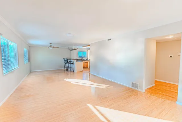 a room with a table and chairs