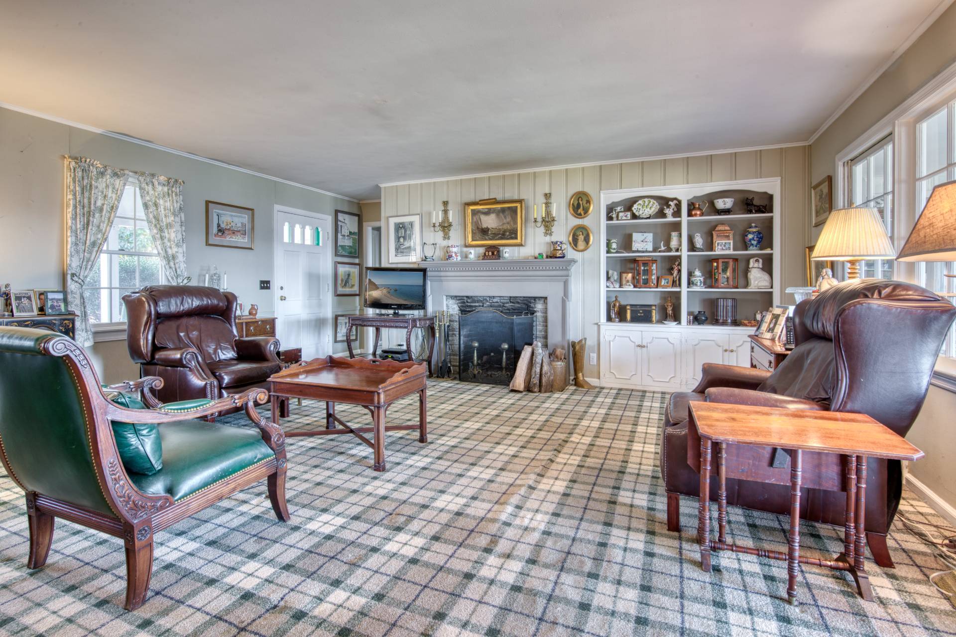 335 Sound View Road Orient, NY 11957 - Photo 22 of 22 a living room with furniture and a fireplace