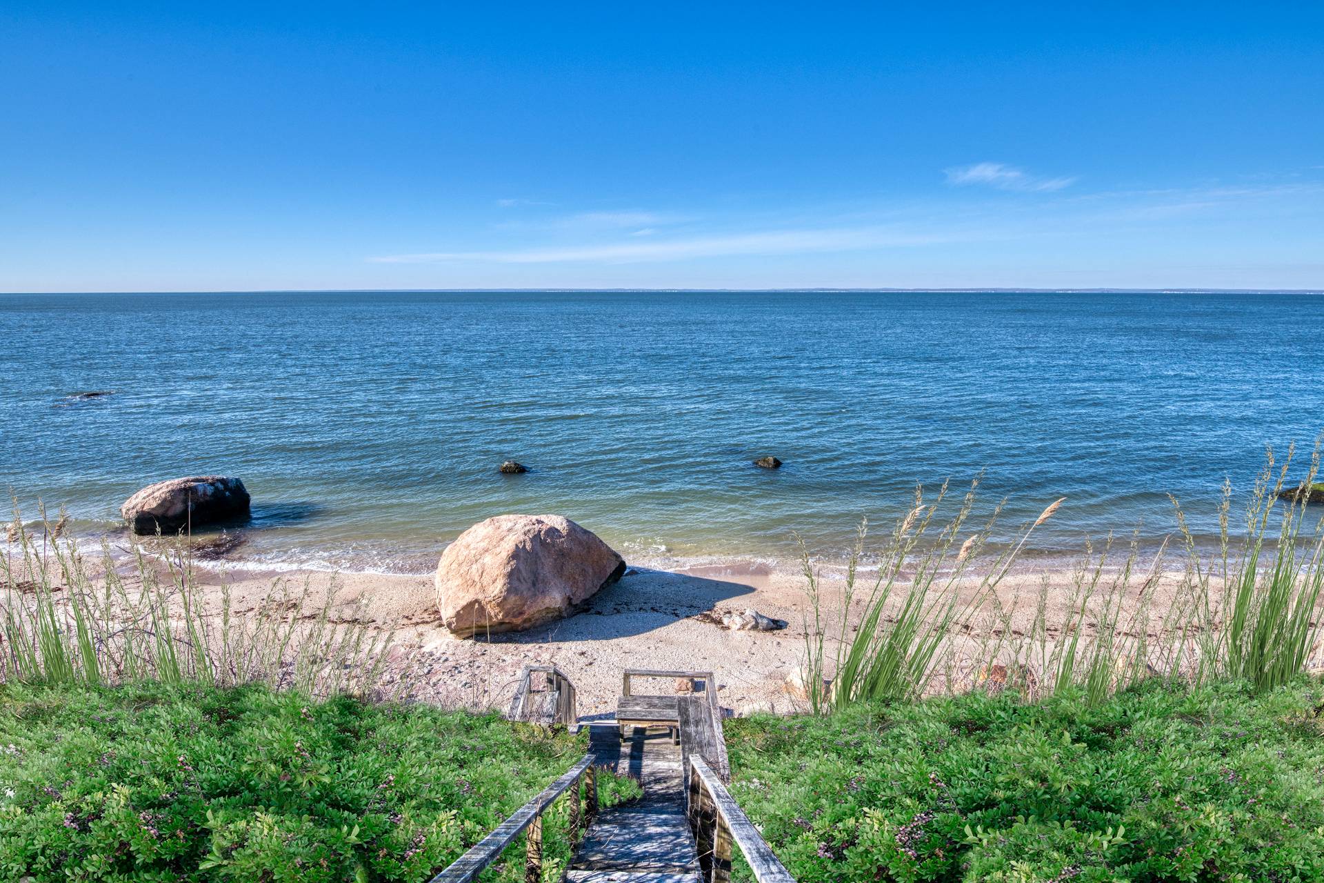 335 Sound View Road Orient, NY 11957 - Photo 4 of 22 a view of a lake from a yard
