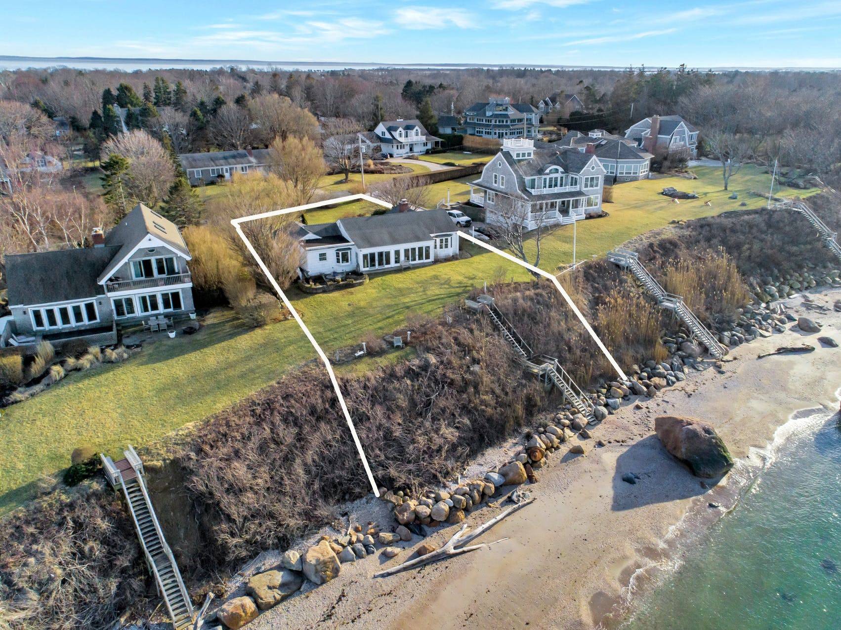 335 Sound View Road Orient, NY 11957 - Photo 9 of 22 a view of a swimming pool with lounge chairs