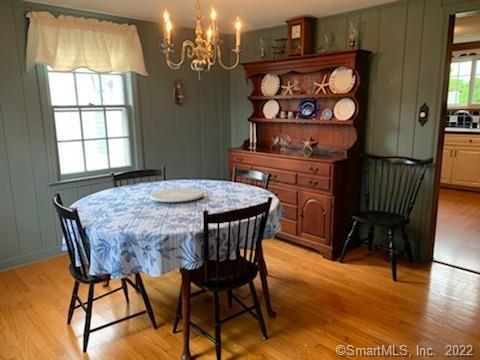 22 Fairview Avenue Madison, CT 06443 - Photo 18 of 31 a view of a dining room with furniture and chandelier