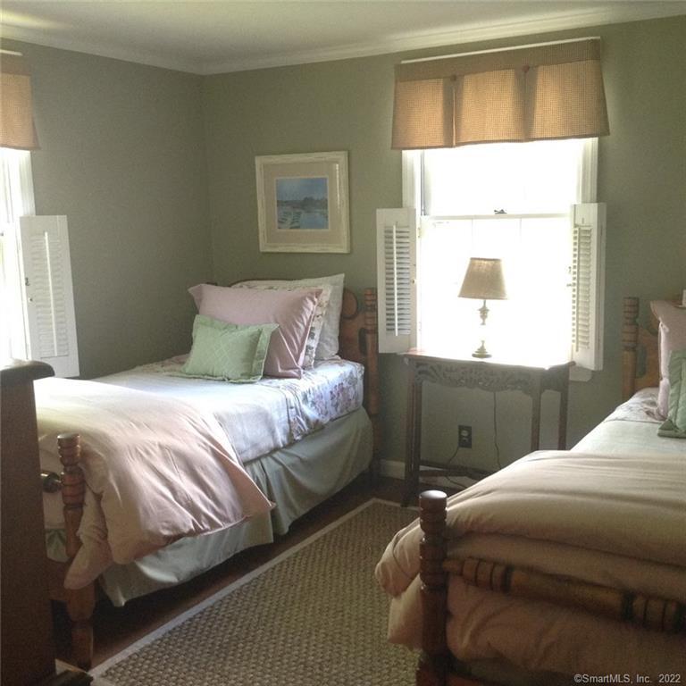 22 Fairview Avenue Madison, CT 06443 - Photo 20 of 31 a bedroom with a bed and a window