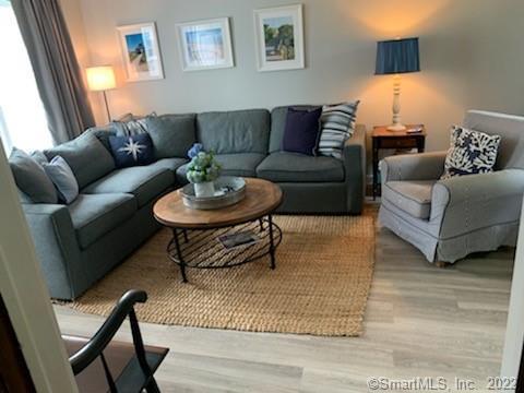 22 Fairview Avenue Madison, CT 06443 - Photo 7 of 31 a living room with furniture and a wooden floor