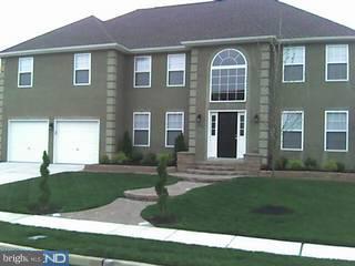 154 Quiet Road Sicklerville, NJ 08081 - Photo 1 of 6 a front view of a house with garden