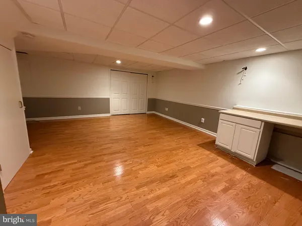 a view of an empty room with a sink