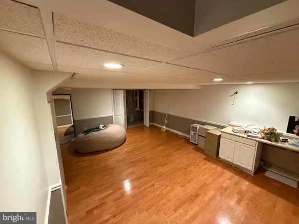 a room with a bed and furniture