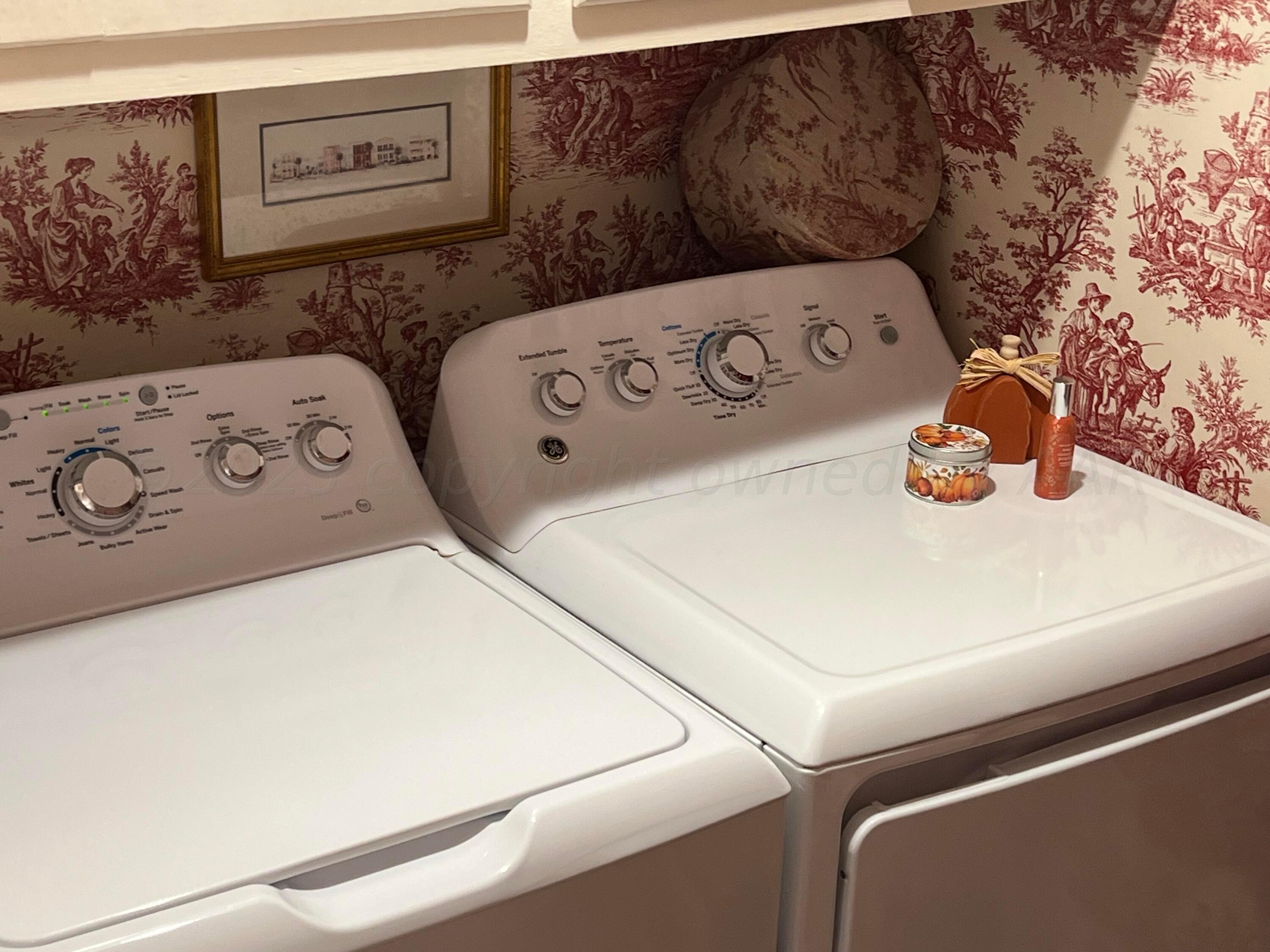 1505 Pellinore Street Borger, TX 79007 - Photo 39 of 73 a utility room with dryer and washer