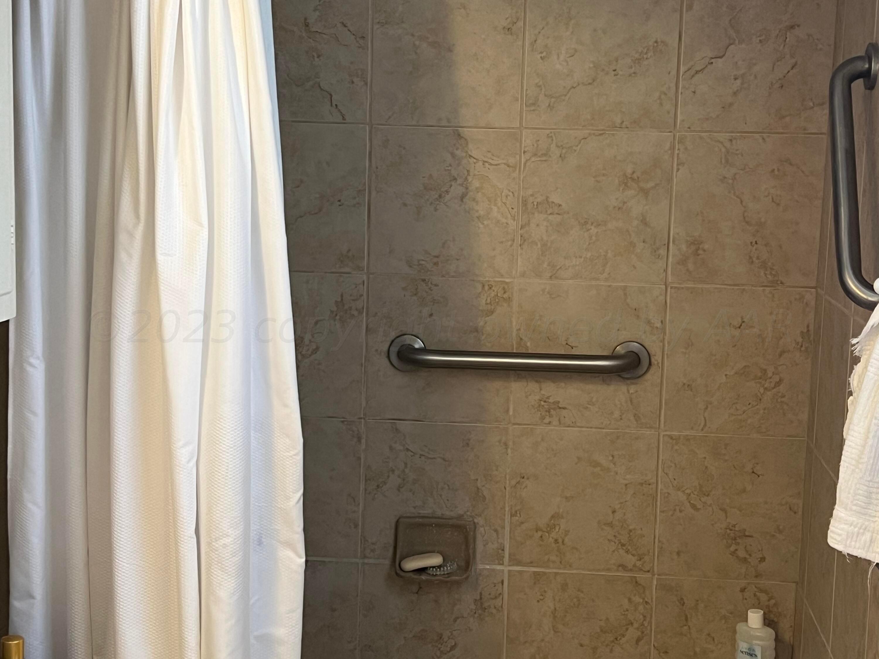 1505 Pellinore Street Borger, TX 79007 - Photo 47 of 73 a bathroom with a shower