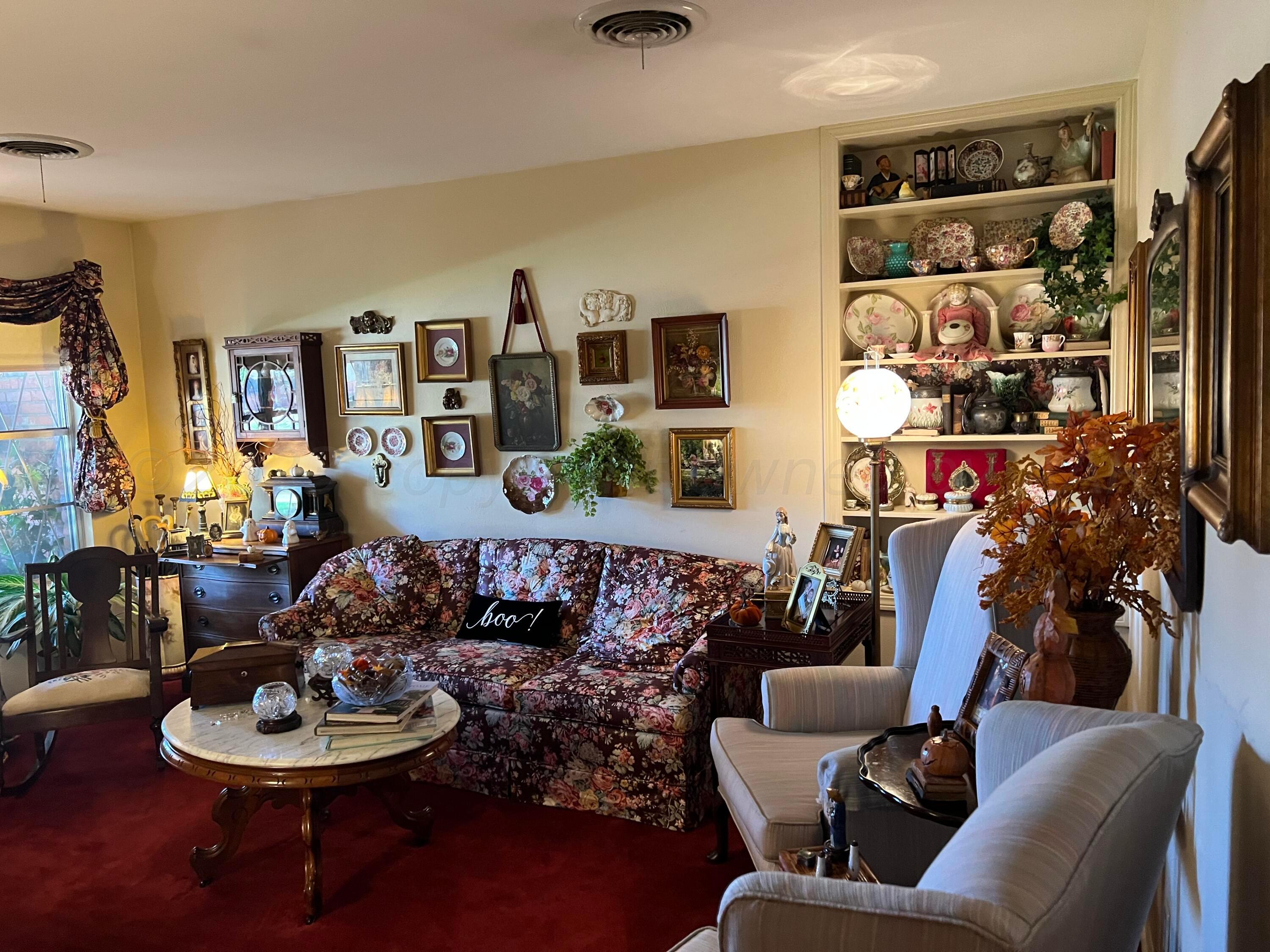 1505 Pellinore Street Borger, TX 79007 - Photo 5 of 73 a living room with furniture and a wooden floor