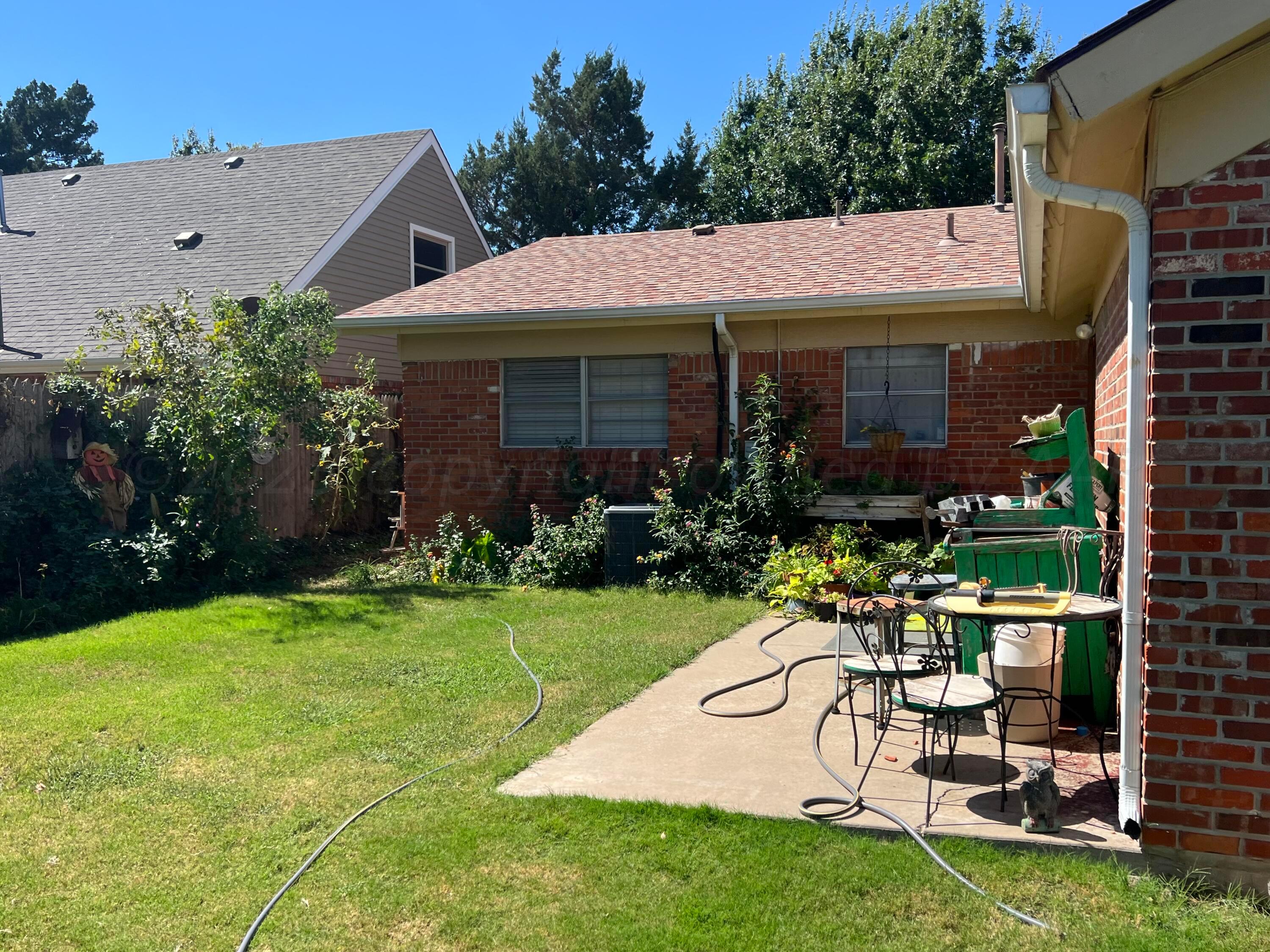 1505 Pellinore Street Borger, TX 79007 - Photo 54 of 73 a view of a house with garden and sitting area