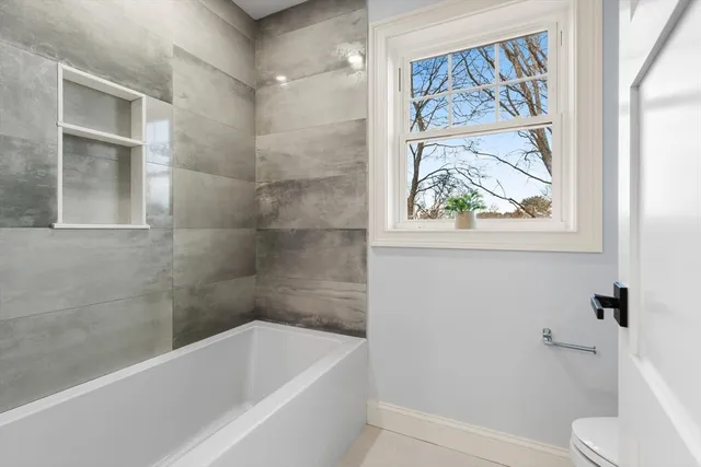 a view of a hallway view with staircase