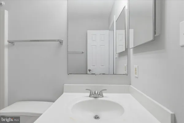 a bathroom with a sink and a toilet