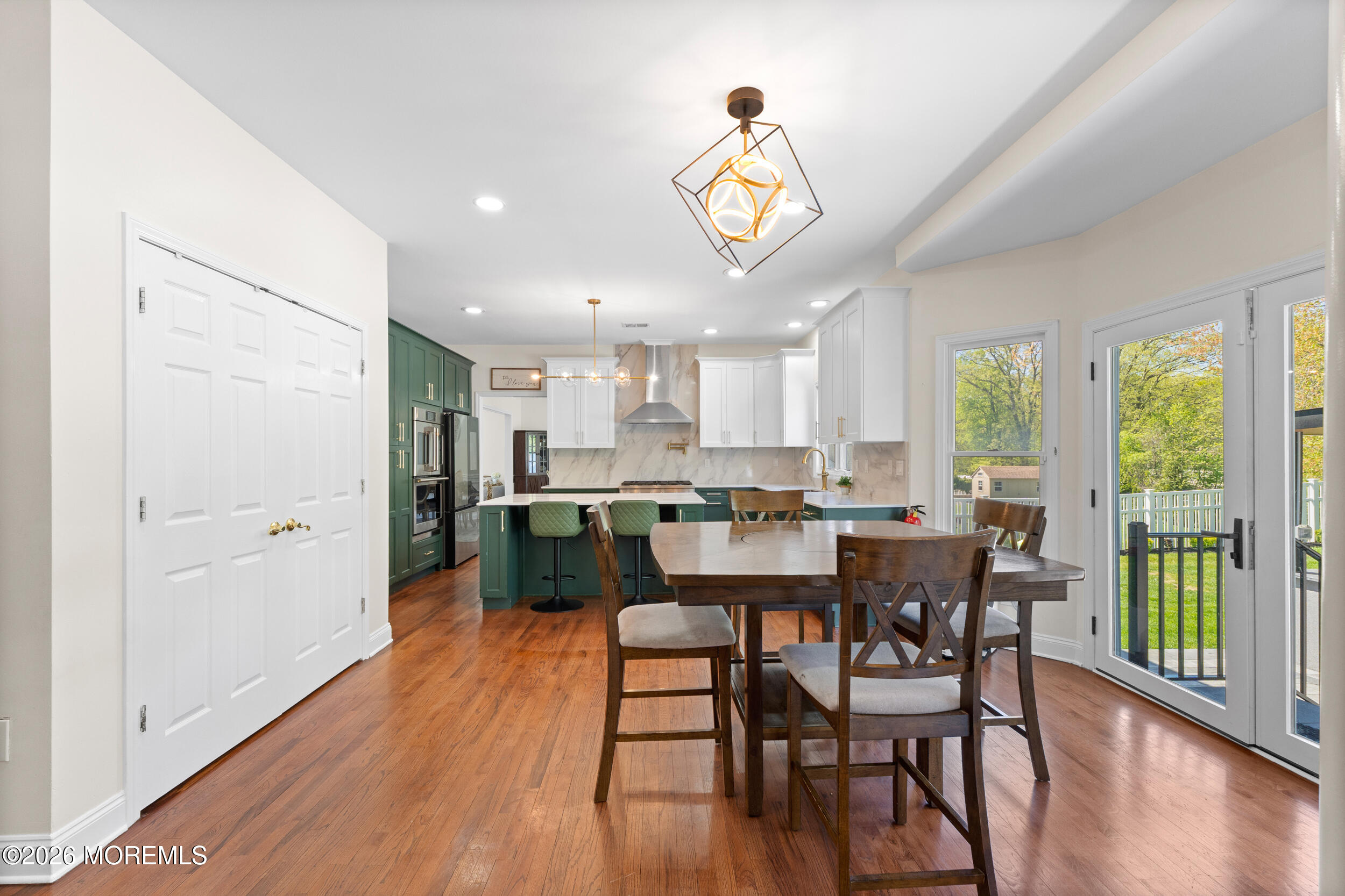 104 Autumn Road Matawan, NJ 07747 - Photo 18 of 64 a view of a dining room with furniture window and wooden floor