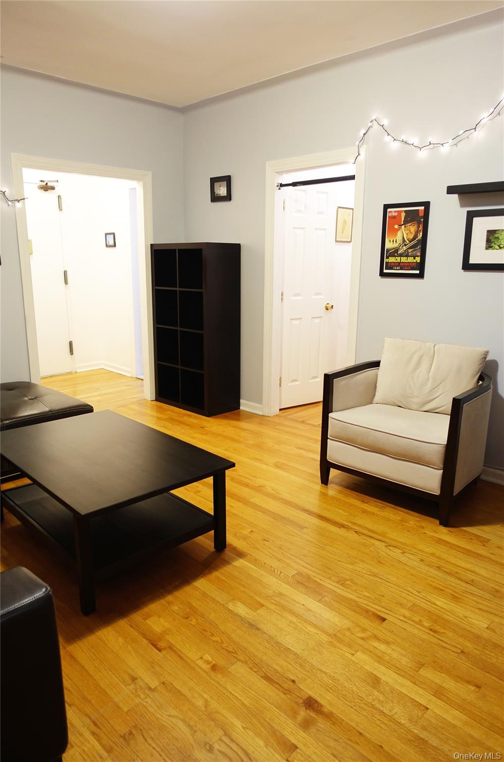 62-64 Saunders Street, Unit 4P Queens, NY 11374 - Photo 3 of 9 a living room with furniture pool and a rug