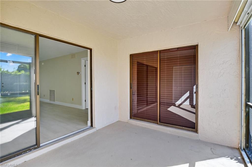 5773 Gage Lane, Unit B101 Naples, FL 34113 - Photo 18 of 39 a view of a room with door