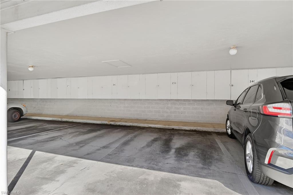 5773 Gage Lane, Unit B101 Naples, FL 34113 - Photo 24 of 39 a view of a room with an empty space and a window
