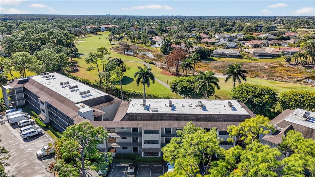 5773 Gage Lane, Unit B101 Naples, FL 34113 - Photo 28 of 39 an aerial view of a house with a lake view