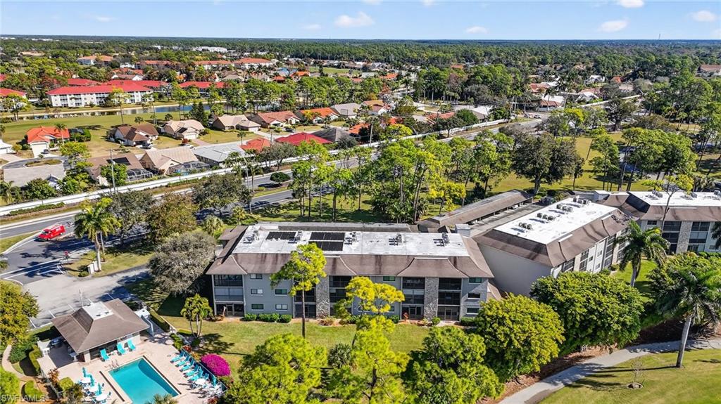 5773 Gage Lane, Unit B101 Naples, FL 34113 - Photo 36 of 39 an aerial view of multiple house