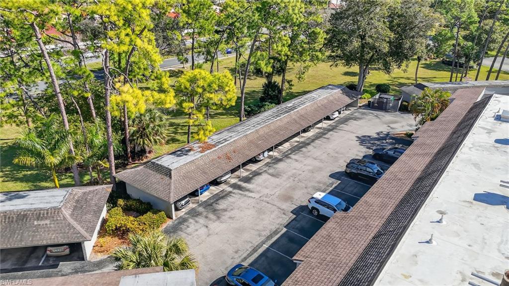 5773 Gage Lane, Unit B101 Naples, FL 34113 - Photo 38 of 39 a view of a yard with plants
