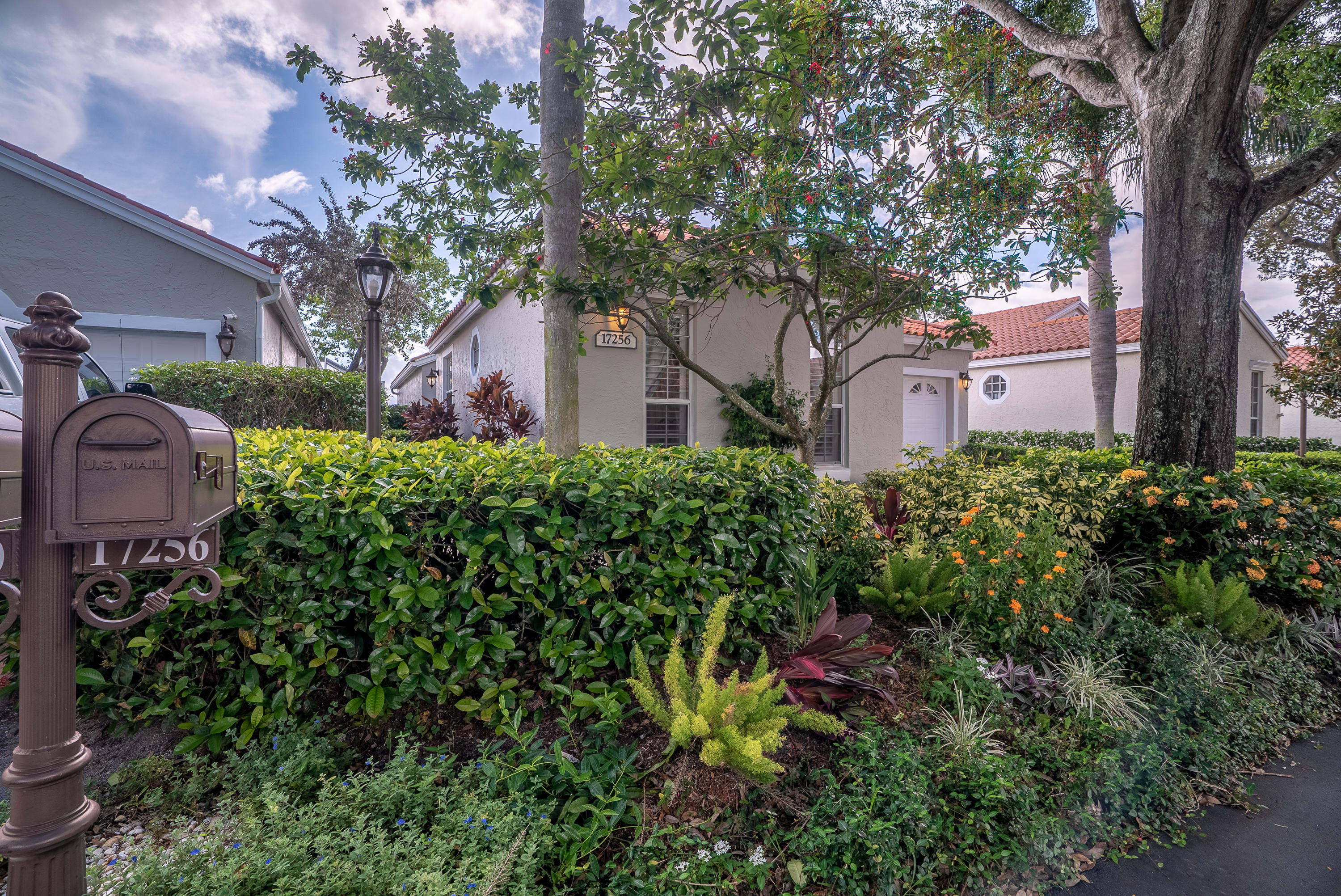 17256 Antigua Point Way Boca Raton, FL 33487 - Photo 5 of 19 AntiguaPoint-frontwithflowers