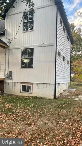 a house with garden in front of it