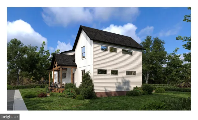 a view of house with backyard and garden
