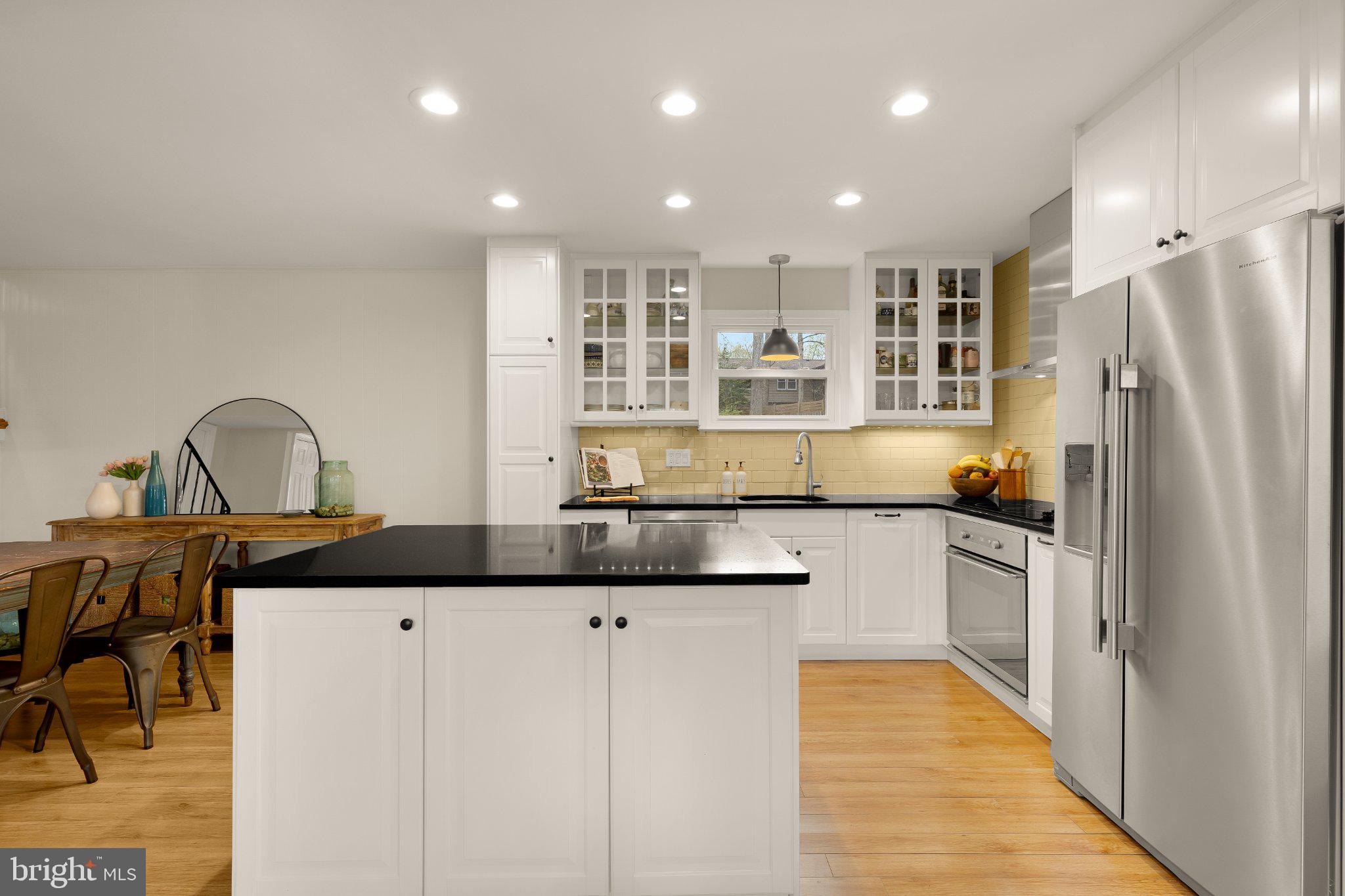 6800 Riata Court Springfield, VA 22153 - Photo 11 of 37 Modern kitchen with sleek design.